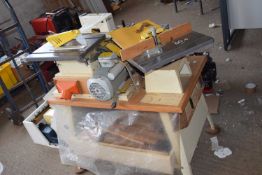 workbench with thickness plainer, circular saw and spindle.