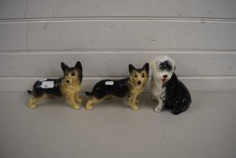 THREE CERAMIC MODELS OF ALSATIAN DOGS AND A ST BERNARD DOG (3)