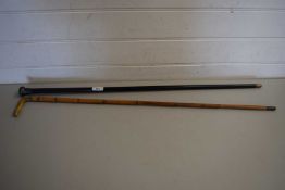 BLACK WOODEN WALKING CANE WITH SILVER MOUNT, TOGETHER WITH A BAMBOO EXAMPLE