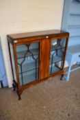EARLY 20TH CENTURY DISPLAY UNIT WITH TWO GLAZED DOORS