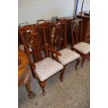 GROUP OF SIX DINING CHAIRS WITH ORNATE CARVED BACKS AND FABRIC SEATS