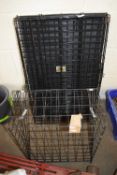 FOLDING METAL PET CAGE AND A FURTHER WEDGE FORMED SPRING LOADED CAGE