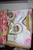 FLORAL DECORATED SET OF DRESSING TABLE BRUSHES, MIRRORS, CANDLESTICKS AND CLOCKS