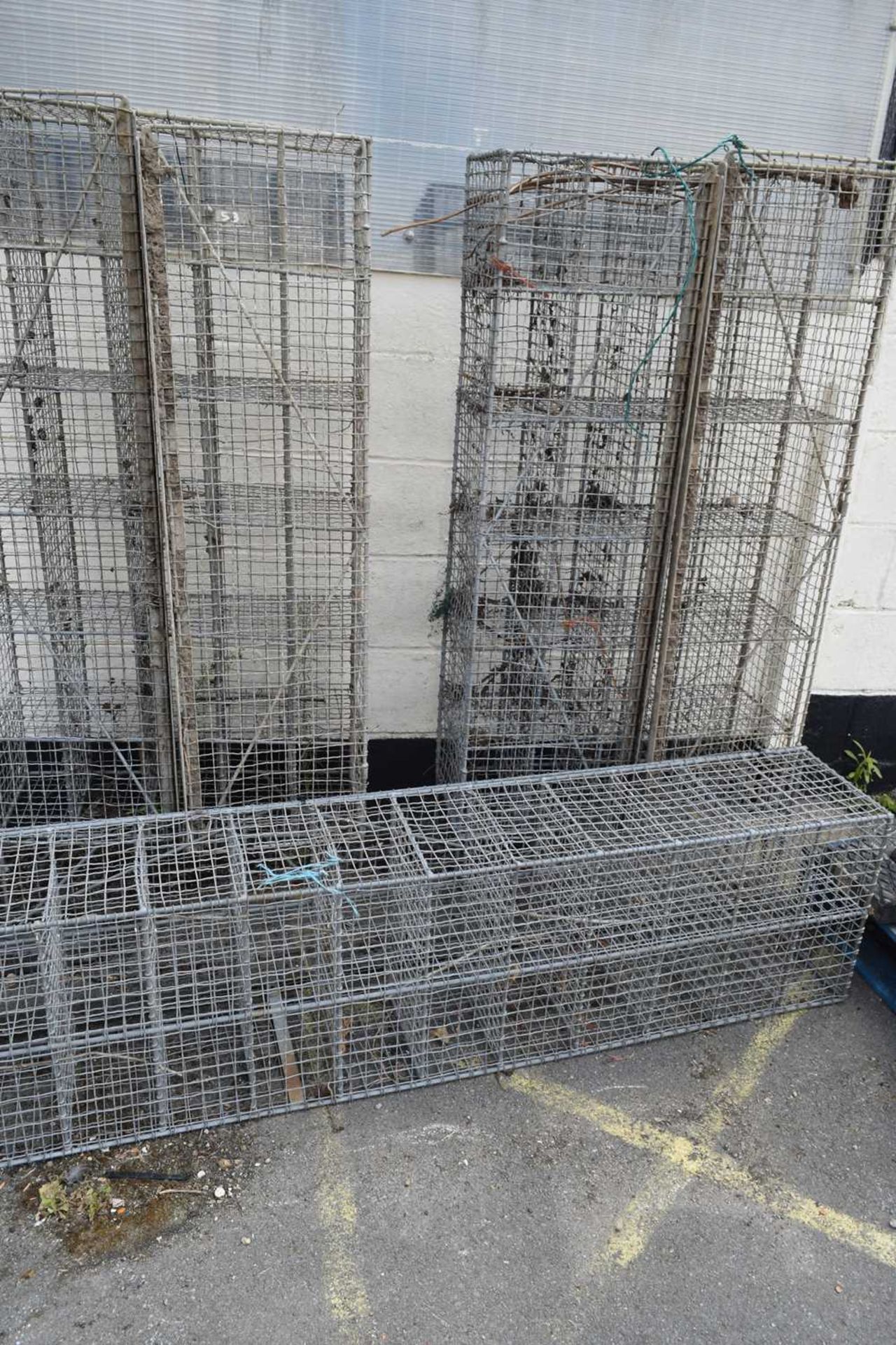 Three vintage wire lockers, height approx 158cm