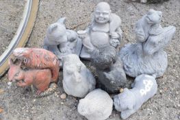 Eight small composite statues to include Buddha, frog, squirrel etc