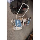 Small child's play pram marked 'Simcett Toby'