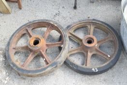 Two cast iron wheels, width 50cm