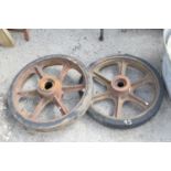 Two cast iron wheels, width 50cm