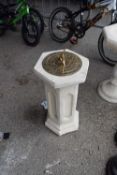 Brass sun dial on a composite plinth, total height approx 60cm