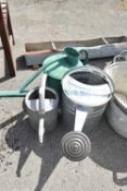 Three tin and galvanised watering cans