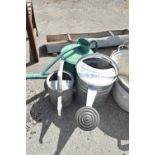 Three tin and galvanised watering cans