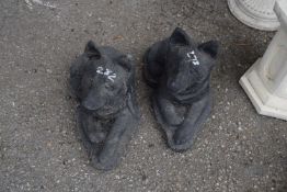 Pair of composite garden statues of dogs, height 25cm (2)