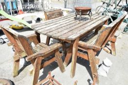 Large wooden garden table with bench and two chairs