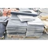 Pallet of artificial slate roofing tiles