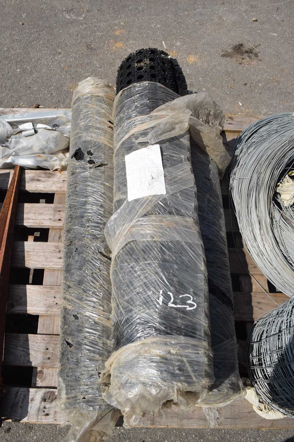 Three rolls of rubber ground matting, width 100cm