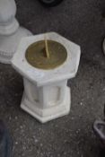 Small brass sun dial on a composite plinth, height approx 40cm