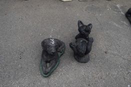 Two composite garden statues, one of a dog, one of a fox, largest 40cm