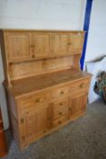 MODERN PINE KITCHEN DRESSER WITH FOUR SMALL DOORS TO BACK AND A BASE WITH SIX DRAWERS AND TWO DOORS,