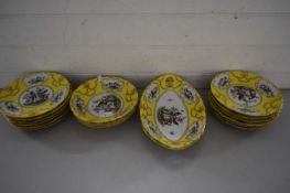 PART SET OF CONTINENTAL YELLOW AND GILT DECORATED DESSERT WARES