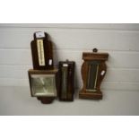 THREE WALL MOUNTED THERMOMETERS AND BAROMETERS