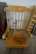 MID-20TH CENTURY STICK BACK ROCKING CHAIR TOGETHER WITH A MAGAZINE RACK (2)