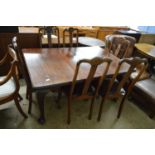 EARLY 20TH CENTURY MAHOGANY EXTENDING DINING TABLE ON CABRIOLE LEGS TOGETHER WITH A SET OF SIX
