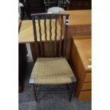 LATE 19TH CENTURY STICK BACK SIDE CHAIR WITH CORD COVERED SEAT