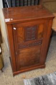LATE VICTORIAN WALNUT VENEERED MUSIC CABINET WITH CARVED DECORATION, 53CM WIDE
