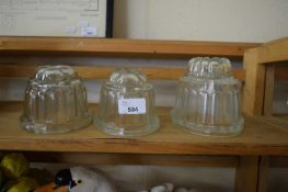 THREE GLASS JELLY MOULDS