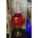 OIL LAMP WITH RED GLASS SHADE