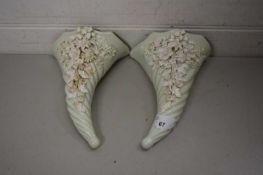 PAIR OF CERAMIC WALL POCKETS WITH APPLIED WHITE FLORAL DECORATION