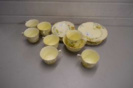 CROWN STAFFORDSHIRE PART TEA SET WITH A PRINTED YELLOW FLORAL DESIGN