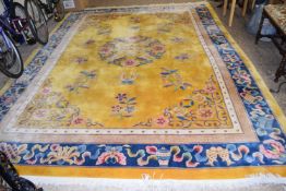 VERY LARGE LOUNGE CARPET, FLORAL DESIGN TO CENTRE WITH BLUE BORDERS WITH SCROLL DESIGNS