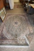 LARGE RUG WITH GREEN GROUND WITH GEOMETRIC (Pleae note VAT is to be added on hammer price for this
