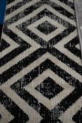 PACO HOME FLOOR RUG, BLACK/WHITE, 80 X 150CM (Pleae note VAT is to be added on hammer price for this