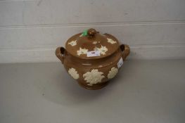 POTTERY POT AND COVER WITH APPLIED FLORAL DECORATION
