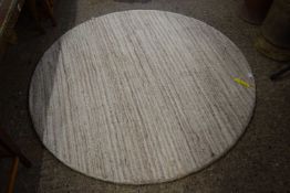 LIGHT GREY CIRCULAR RUG (Pleae note VAT is to be added on hammer price for this lot)