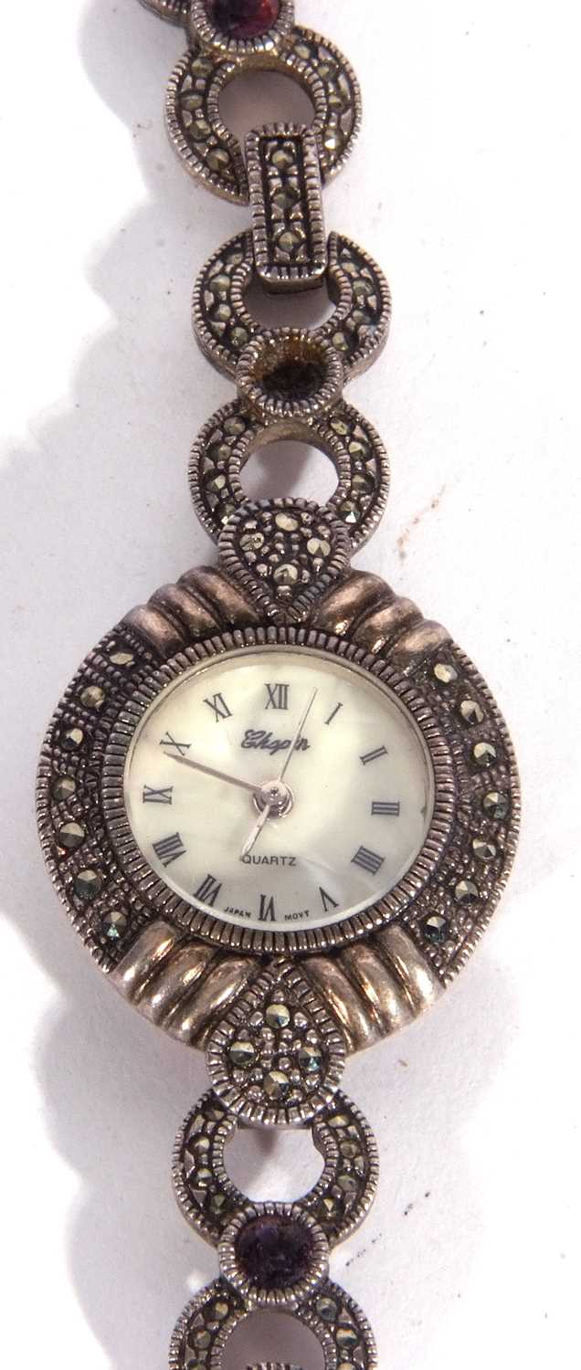 White metal ladies wrist watch featuring a mother of pearl dial with various coloured stones on - Image 3 of 5