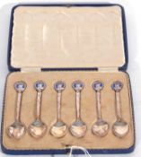 Cased set of six Edward VIII coffee spoons with enamelled finials depicting cameo portraits of