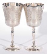 Pair of Elizabeth II small goblets of inverted bell form to a baluster stem and plain circular foot,