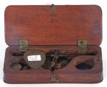 Pair of 19th century mahogany cased steel and brass pan apothecary scales, together with a