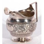 George III large baluster cream jug with reeded rim and angular handle, plain circular foot, later