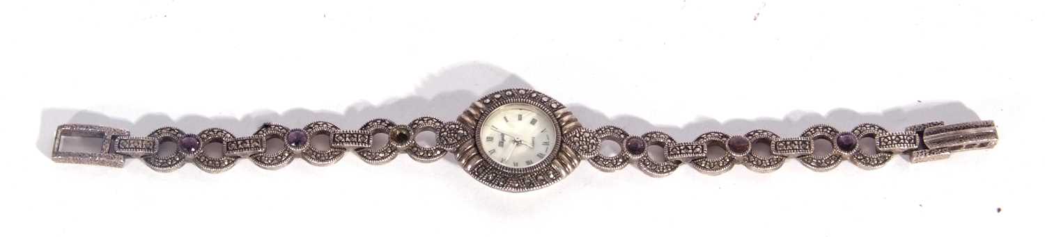White metal ladies wrist watch featuring a mother of pearl dial with various coloured stones on - Image 4 of 5