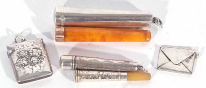 Mixed Lot: vintage amber and 9ct gold mounted cigarette holder in hallmarked silver case, Birmingham