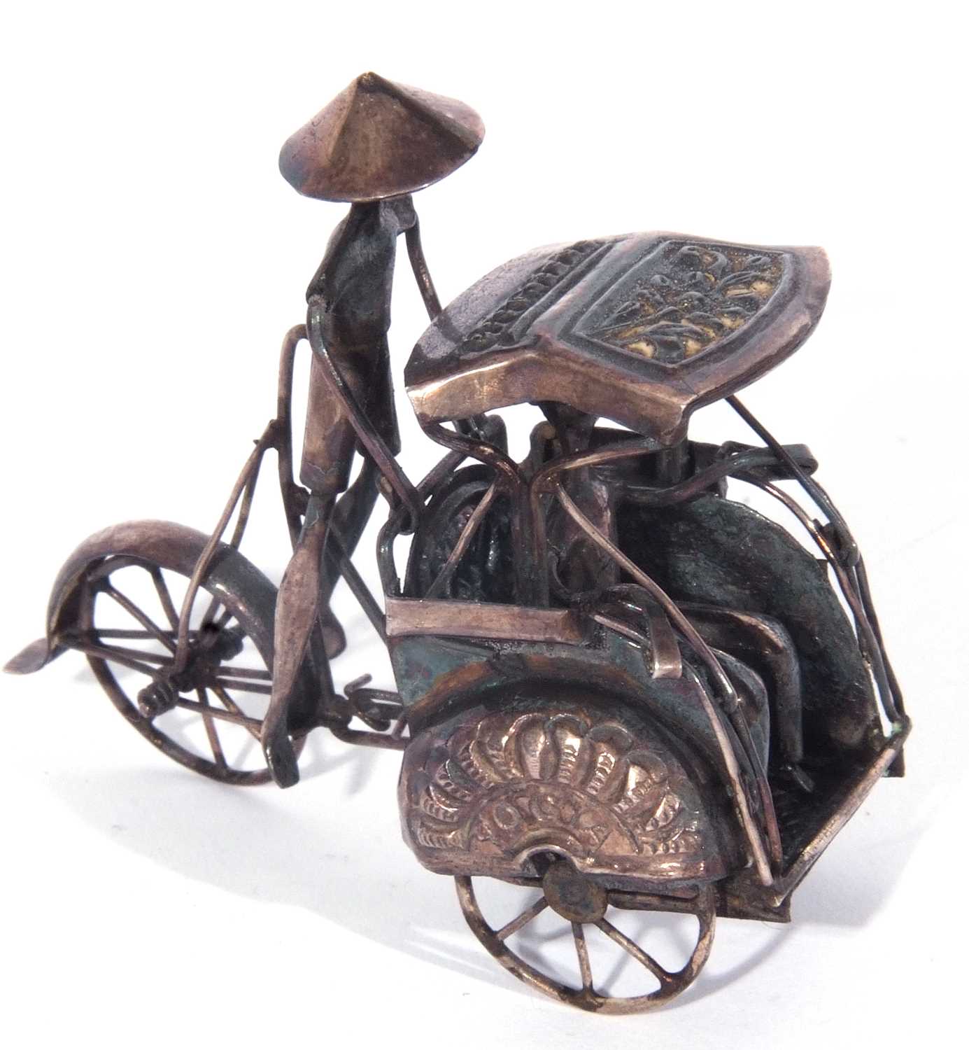 Mid/late 20th century white metal model of a rickshaw with figures, 6cm wide x 5cm tall, stamped ‘