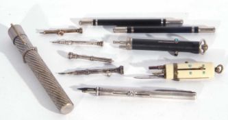 Collection of ten assorted late 19th/early 20th century pens and pencils including a 'sterling' pen,