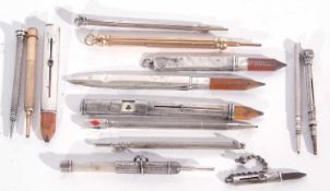 Collection of vintage pens and pencils, including hallmarked silver cased bridge pencil with built