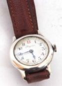 Early 20th century white metal Longines wrist watch, a 15-jewel crown wound Longines stamped