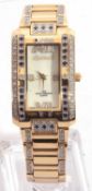 Ladies stainless steel Ingersoll quartz diamond and sapphire set watch, the iridescent dial
