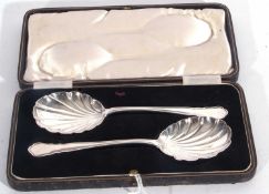 George V cased large pair of Dubarry pattern, shell bowled fruit serving spoons, 21cm long,